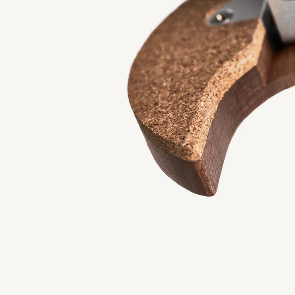 Oiled cork cushions contact points to help prevent scratches  and marks.