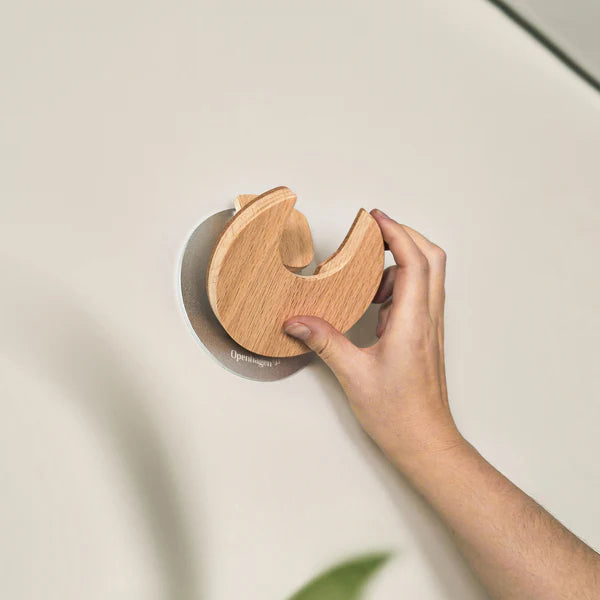 One motion. Secure hold. The easiest way to keep your guitar  accessible - without stands on the floor.